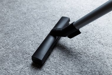 vacuum cleaner on the carpet. House cleaning.