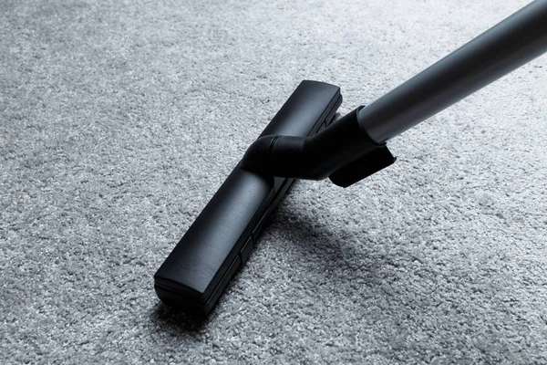 vacuum cleaner on the carpet. House cleaning.