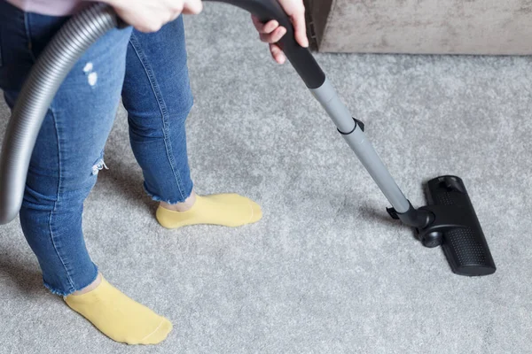 Girl Blue Jeans Vacuums Carpet House Cleaning — Stockfoto