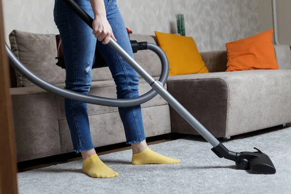 Close Photo Legs Girl Vacuum Cleaner Her Hands Girl Cleans — Foto de Stock