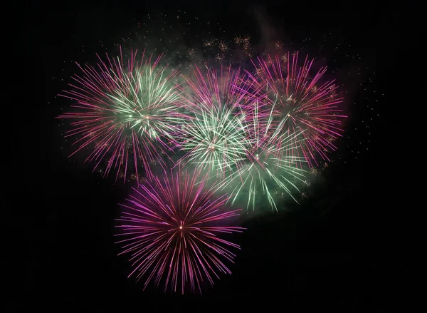 Pink and green fireworks — Stock Photo, Image