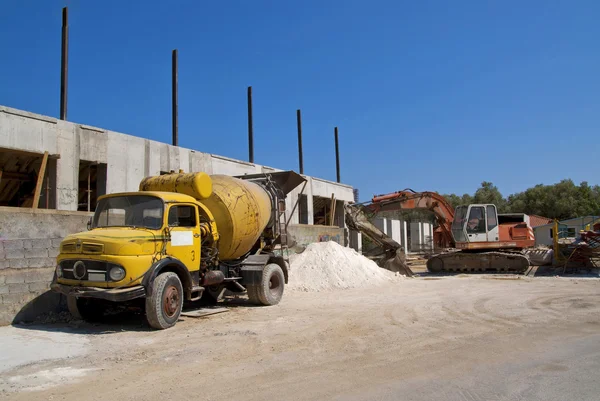 Cement mixer truck and digger