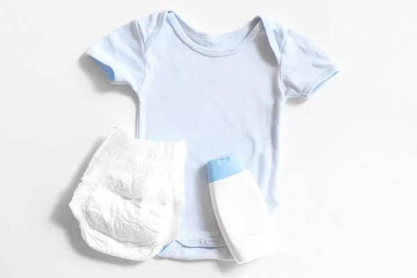 Conceito Infância Puericultura Vestuário Fralda Loção Para Bebés — Fotografia de Stock