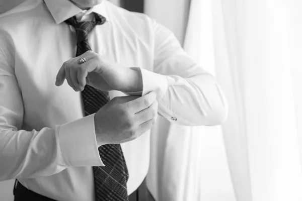 Man Buttoning Cuff His Shirt — Stock Photo, Image