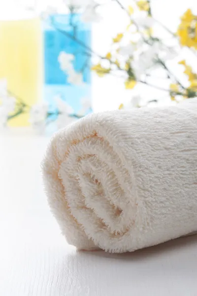 Rolled up beige towel — Stock Photo, Image