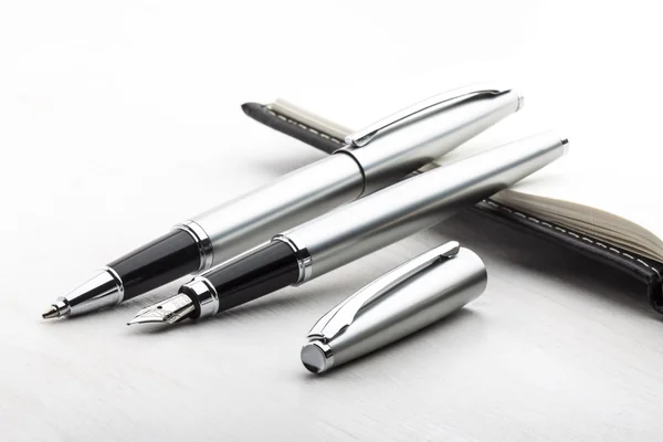 Silver fountain pen and roller pen — Stock Photo, Image