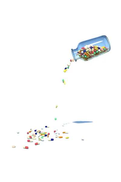 Medicine spilling from the bottle — Stock Photo, Image