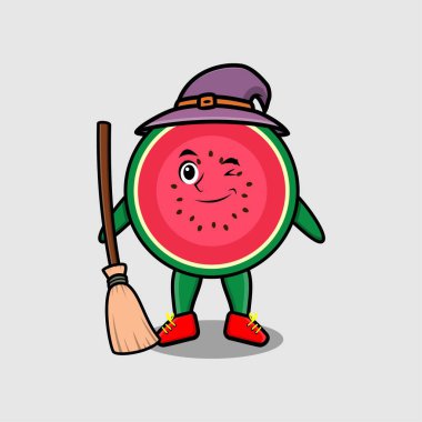 Şapkası ve süpürgesi olan karpuz şeklinde şirin bir cadı.