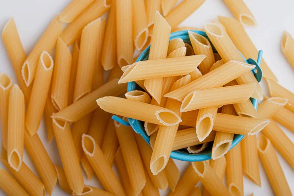 Raw Macaroni Blue Bucket White Background Top View — Stock Photo, Image