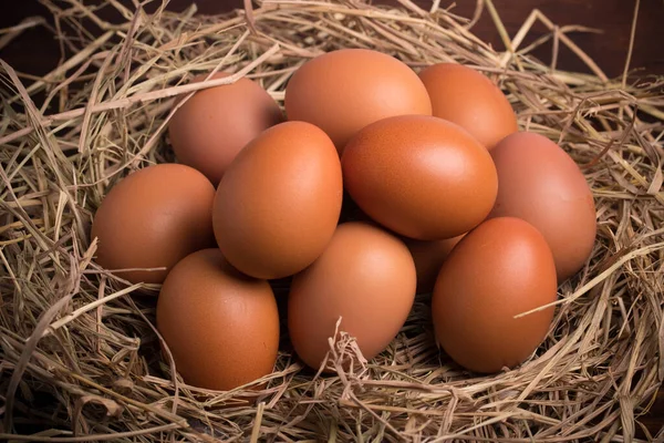 Fresh Chicken Eggs Straw Wooden Background — Stockfoto