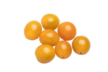 Beyaz zemin üzerinde sarı vişneli domates.