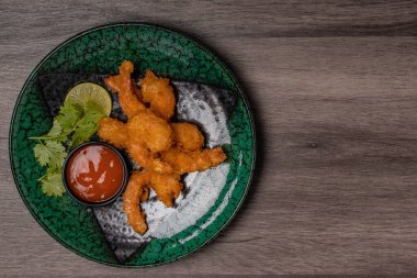 Battered Prawns with Copy Space Chili Sauce