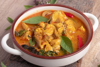 Catfish Curry. Thai food on dark background. Traditional food concept. Top View, Flat Lay, Copy Space