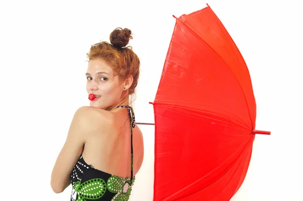 Pretty girl with umbrella and strawberry — Stock Photo, Image