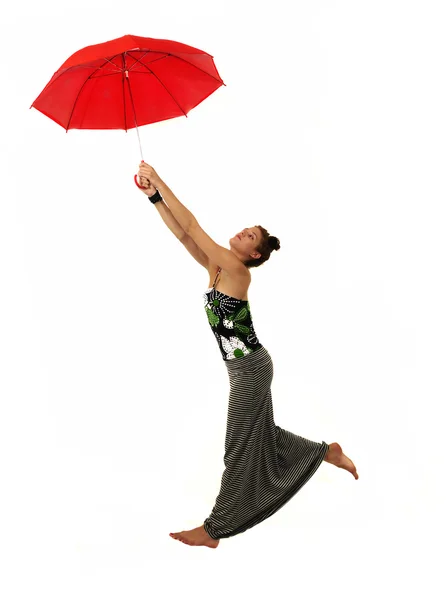 Menina isolada segurando guarda-chuva vermelho — Fotografia de Stock