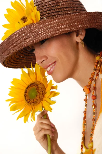 Mladá žena s slunečnice — Stock fotografie