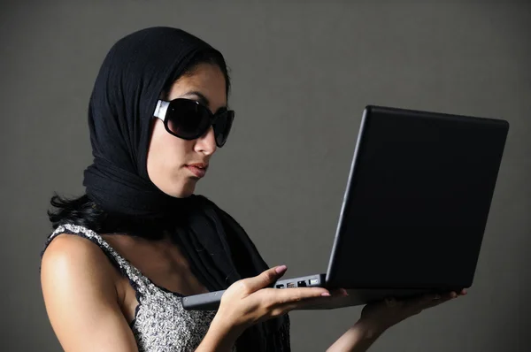 Fashion female holding laptop — Stock Photo, Image