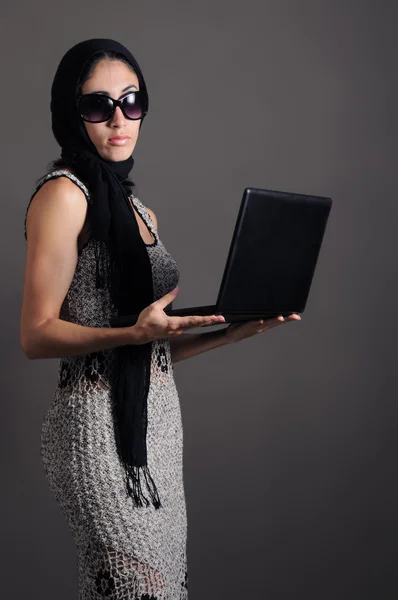 Fashion female holding laptop — Stock Photo, Image