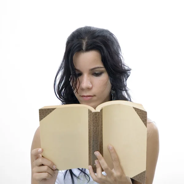 Teen reading a book - isolated — Stock Photo, Image