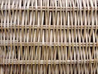 Kuru samandan yapılmış çit ya da arka plandaki bir sarmaşıktan yapılmış dallar.