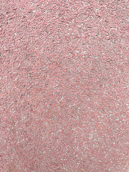 Textured red background, rubber coating for stadiums, running tracks, tennis courts.Top view, close-up — Stock fotografie