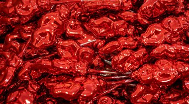 Christmas decorations, top view of a pile of glass balls painted red, Greeting gift card template.