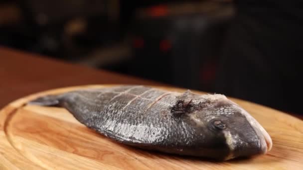 Chef Black Gloves Prepares Sea Bream — Stock Video