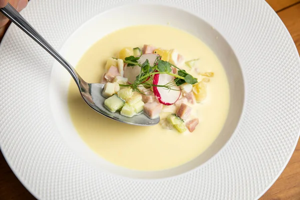 Okroshka soup. Cold soup with potatoes, radishes, yogurt