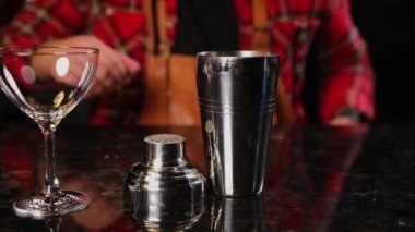 the barman prepares drinks in the restaurant