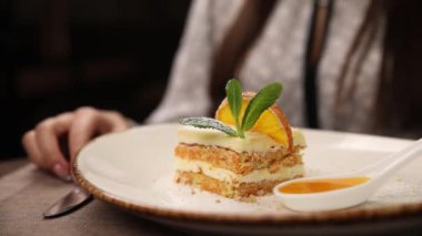 A confectioner prepares a dessert