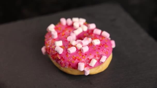 Beautiful Doughnuts Covered Chocolate Glaze Sprinkles Marshmallows Chopped Nuts — Vídeos de Stock