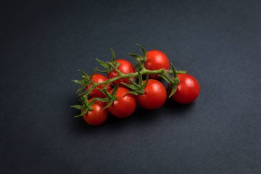 Cherry tomatoes on branches, top view