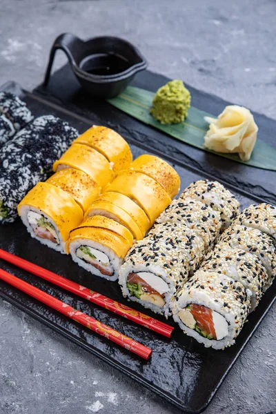 Delicious sushi, a set of rolls with tuna, salmon. Japanese cuisine