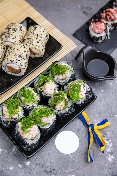 Delicious sushi, a set of rolls with tuna, salmon. Japanese cuisine