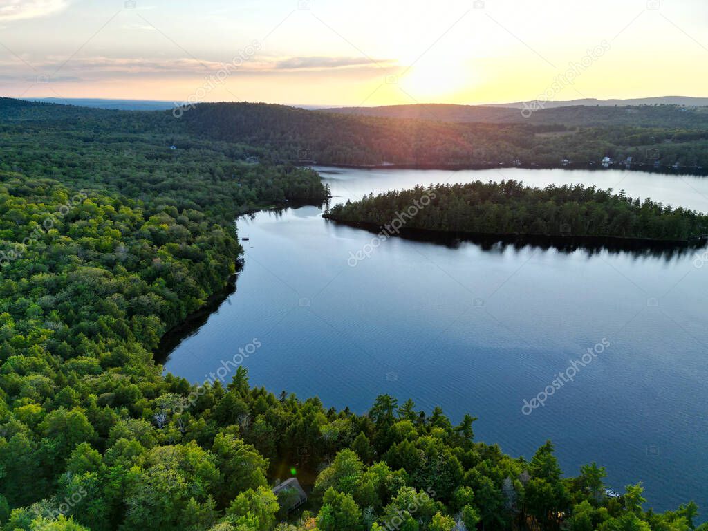 A drone shot of St. George Lake in Liberty, Maine at Sunset. High quality photo