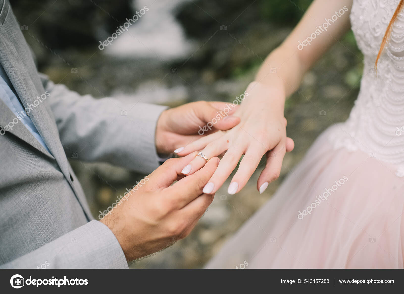 Premium Photo | The newlyweds exchange rings, near the wedding arch, at the  wedding ceremony. marriage. soft focus
