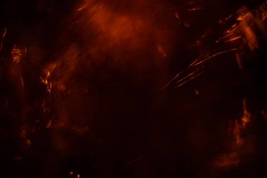 Parlayan parçacık ve çizgilerle soyut arkaplan