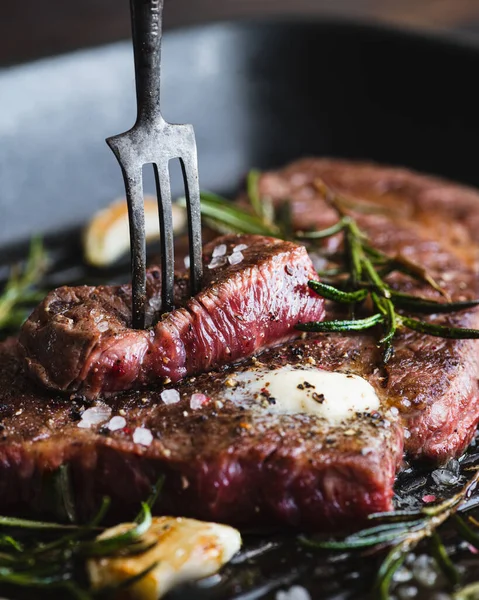 Beef steak with rosemary Stock Image
