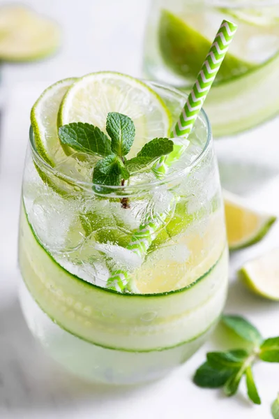 Summer refreshing cocktail with lime and cucumber, selective focus Stock Picture