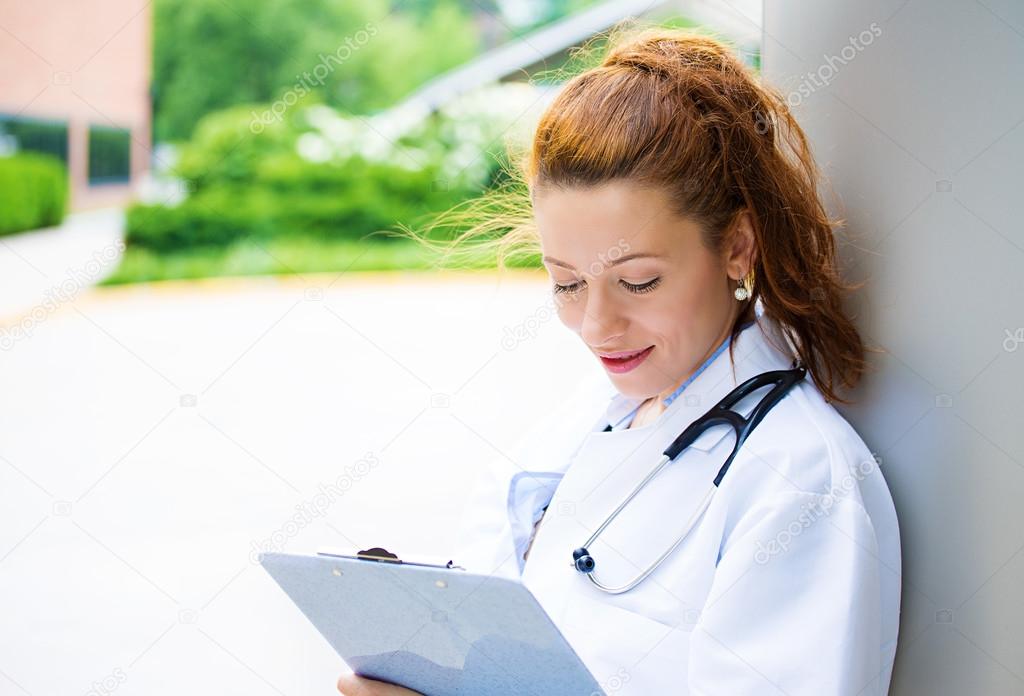 Female doctor outside of the hospital
