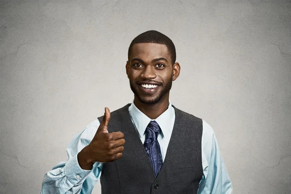 Happy corporate executive giving thumbs up gesture — Stock Photo, Image