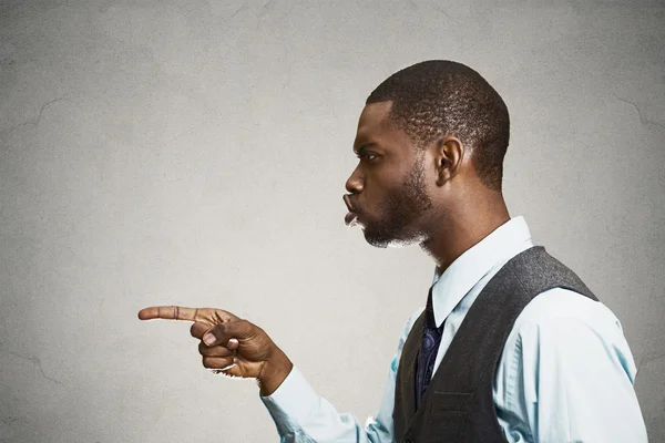 Side view portrait man pointing at someone accusing in wrong doi — Stock Photo, Image