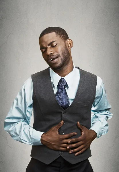 Portrait of a business man having stomach pain — Stock Photo, Image