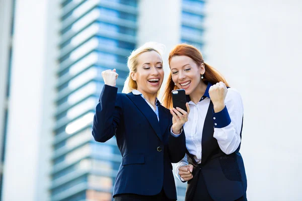 Happy businesswomen celebrating success — Stockfoto