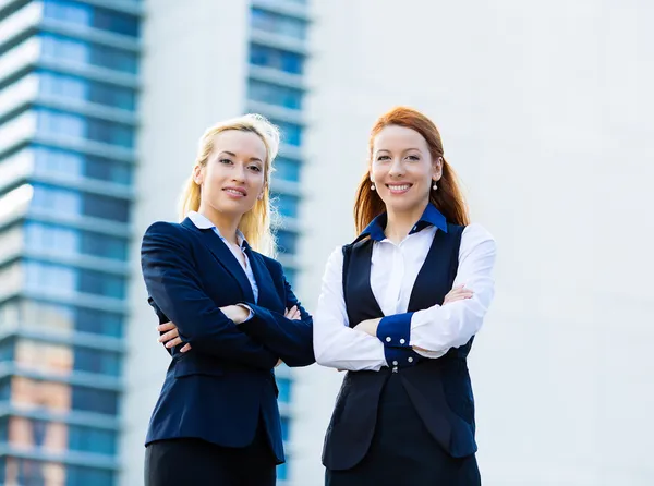 Two confident happy corporate business women — Stock Photo, Image