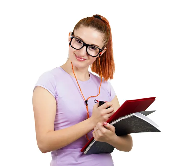 Happy student holding books, listening on music — Stock Photo, Image