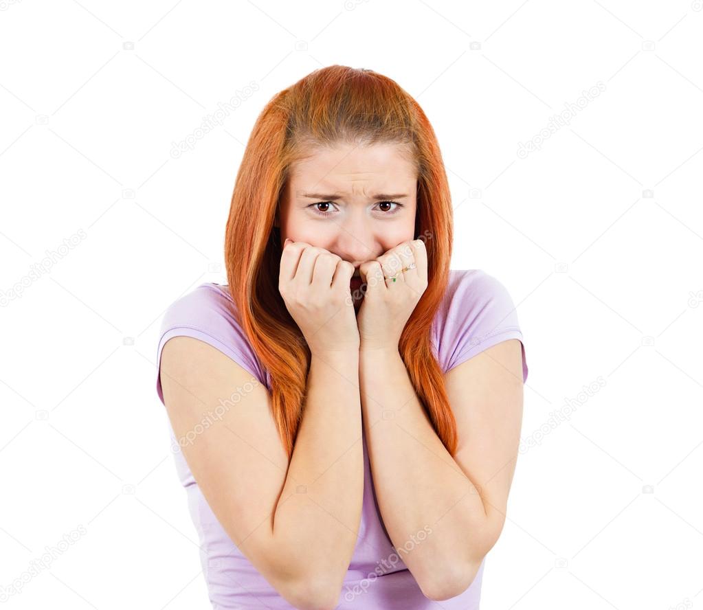 Scared anxious woman biting fingernails 