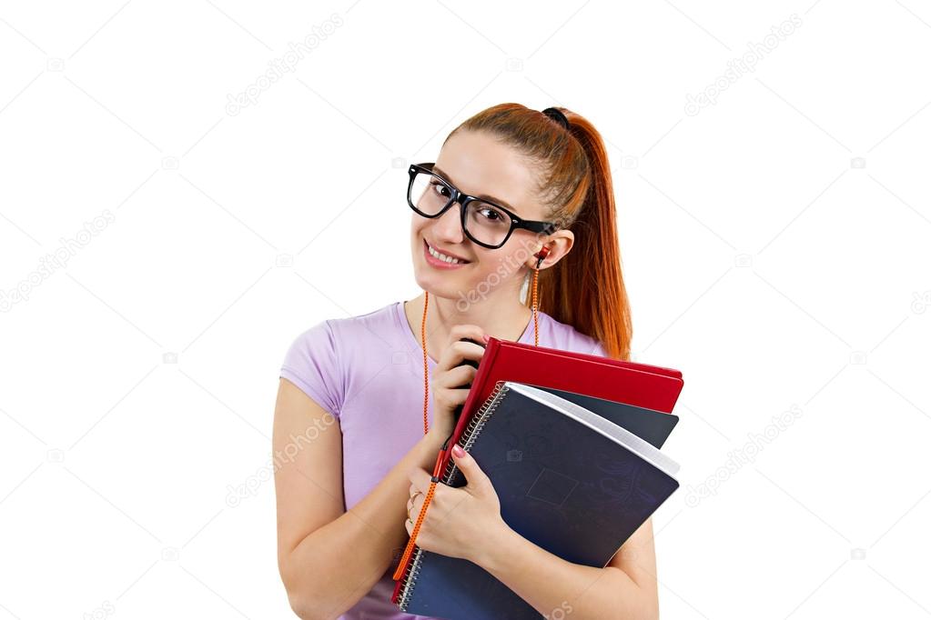 Happy student holding books, listening on music