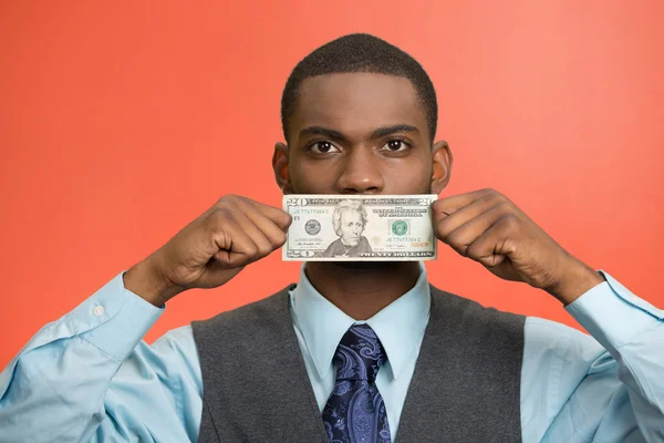 Omkoping man met dollarbiljet op zijn mond — Stockfoto