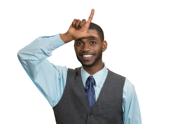 Young executive giving loser sign — Stock Photo, Image